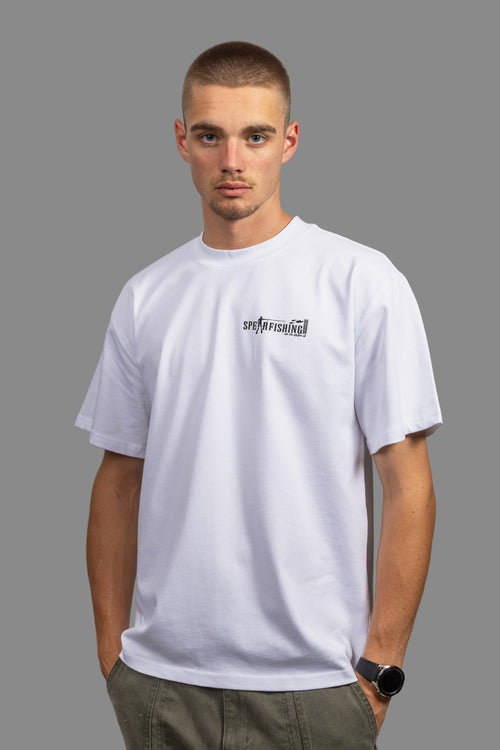 Man wearing a white t-shirt with a logo on a gray background